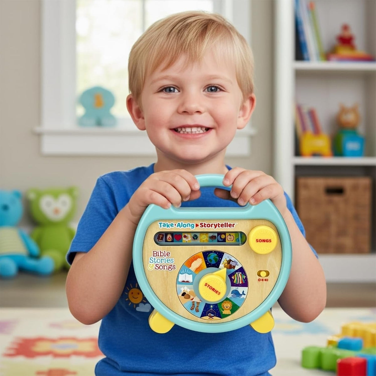 Happy child holding the Take-Along Storyteller